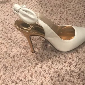 Off-white 3 inch heel with a matching bag